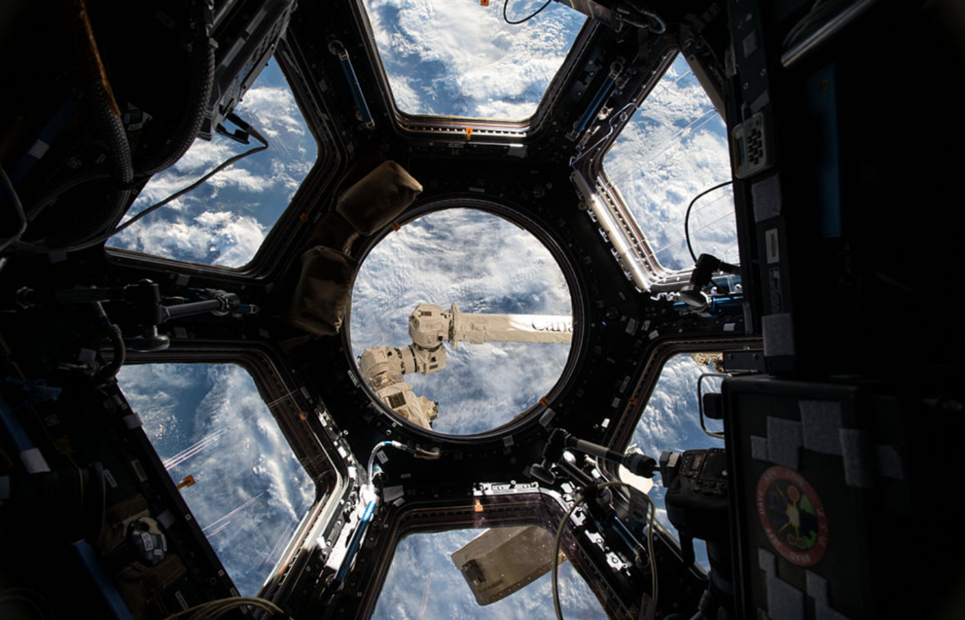 View of earth from inside a space satellite