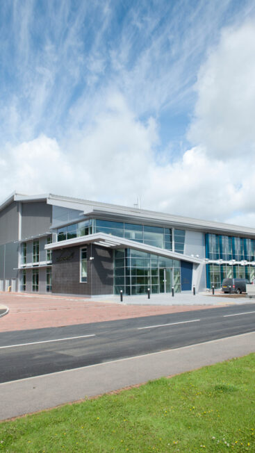 Exterior of the futuristic looking Kepler Building home to Surrey Satellite Technology Ltd