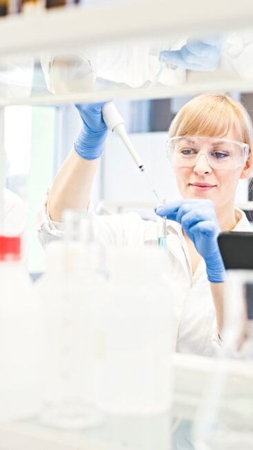 A group of people working in a lab