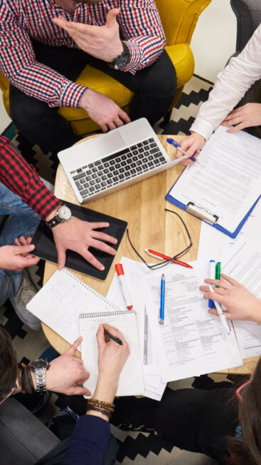 People sat around a business plan