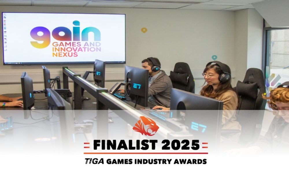 TIGA award logo overlaid image of large table with people gaming.