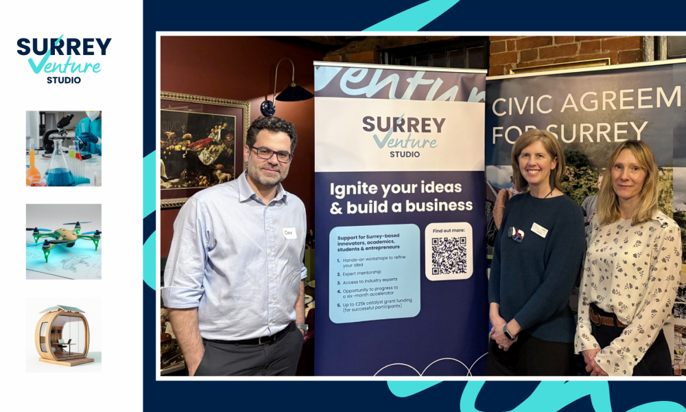 A man and two women stand either side of a Surrey Venture Studio banner.